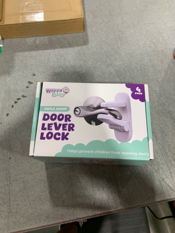 Photo 1 of Door Lever Locks (4 Pack) - Prevents Toddlers from Opening Doors - Durable ABS with 3M Adhesive - Easy One-Hand Operation for Adults, No Tools Needed