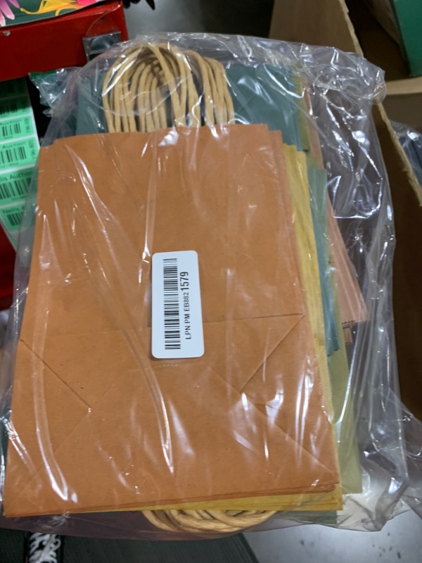 Photo 1 of qiqee 60-Packs Paper Bags with Handles Bulk 8.26"×6"×3.15" Small Gift Bags 16 Different Senior Light Color Bags Multiple Uses?Small Size?