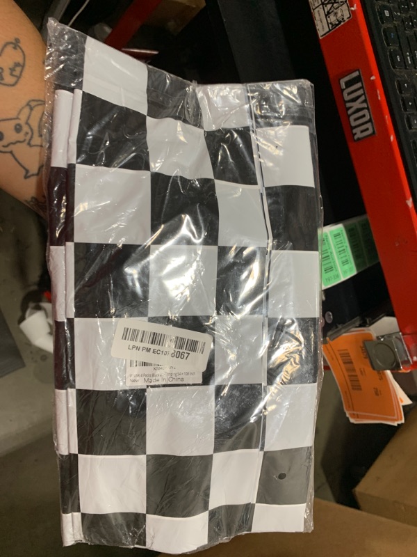 Photo 1 of WNINK 4 Pack Black and White Checkered Disposable Tablecloth Race Car Theme Party Table Cloth, Black checkered tablecloth for Race Car Theme Birthday, Outdoor Picnic Parties Decorations, 54 × 108 Inch