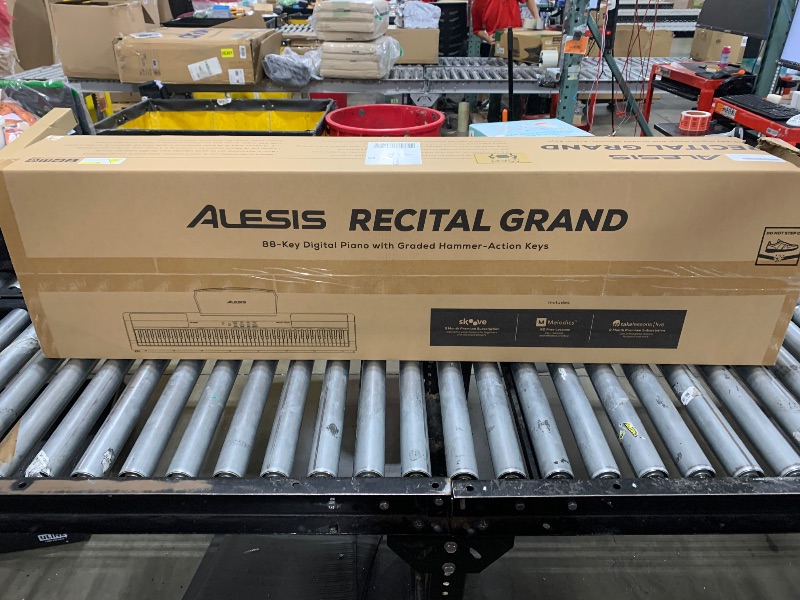 Photo 1 of Alesis Recital Grand - Digital Piano 88 Weighted Keys with Hammer Action, Sustain Pedal, 16 Premium Voices, Speakers, Piano Lessons, Sheet Music Stand
