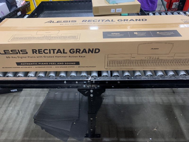 Photo 1 of Alesis Recital Grand - Digital Piano 88 Weighted Keys with Hammer Action, Sustain Pedal, 16 Premium Voices, Speakers, Piano Lessons, Sheet Music Stand
