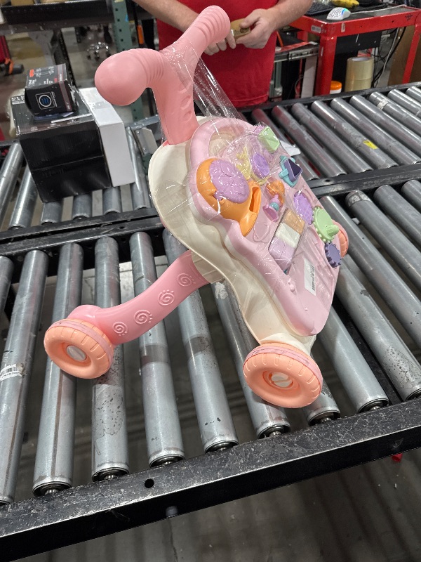 Photo 1 of TOY Life 3 in 1 Baby Push Walker and Activity Center for Girl, Sit to Stand Walker for Babies 6-12 Months, Walking Toys with Music Panel for Infants and Toddlers Learning to Walk Pink