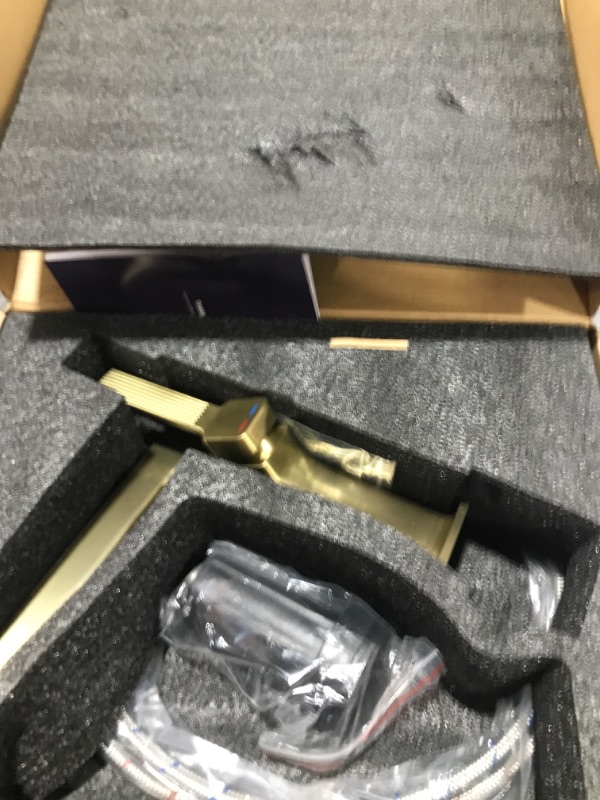 Photo 1 of HMEGAO Waterfall Bathroom Sink Faucet, Single Handle Bathroom Faucets, Single Hole Bathroom Faucet Sink Vanity Restroom Rv, Widespread and Uniquely Designed, Drain Assembly Included, Brushed Gold