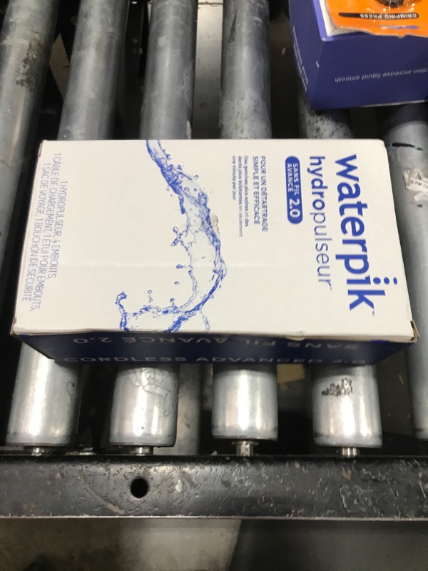 Photo 1 of Waterpik Cordless Advanced 2.0 Water Flosser For Teeth, Gums, Braces, Dental Care With Travel Bag and 4 Tips, ADA Accepted, Rechargeable, Portable, and Waterproof, White WP-580, Packaging May Vary