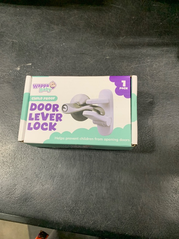 Photo 1 of Door Lever Lock (1 Pack) Prevents Toddlers from Opening Doors. 3.25" L * 1.5" W * 4.5" H Easy One Hand Operation for Adults. Durable ABS with 3M Adhesive Backing. Simple Install, No Tools Needed.