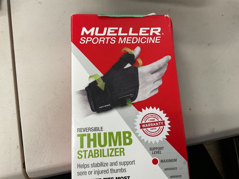 Photo 1 of MUELLER Sports Medicine Adjust-to-Fit Thumb Brace, Spica Splint, Thumb Pain Relief Stabilizer for Men and Women, Ideal for De Quervain's Tenosynovitis, Arthritis, Sprains, Fits Right or Left, Black, One Size