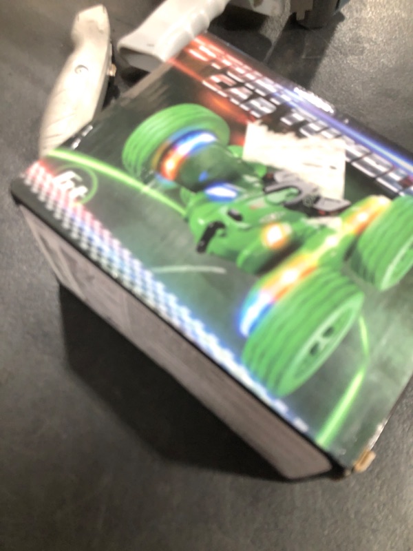 Photo 1 of Terucle Remote Control Car, Rc Cars Stunt RC Car Toys Upgraded Strip Lights and Headlights Kids Toys Double-Sided 360° Rotating 4WD Drift Truck for Boys Girls Birthday Gift (Green)