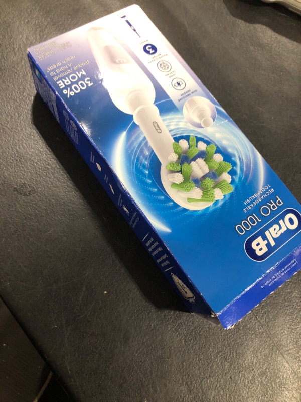 Photo 1 of Oral-B Pro 1000 Rechargeable Electric Toothbrush, White