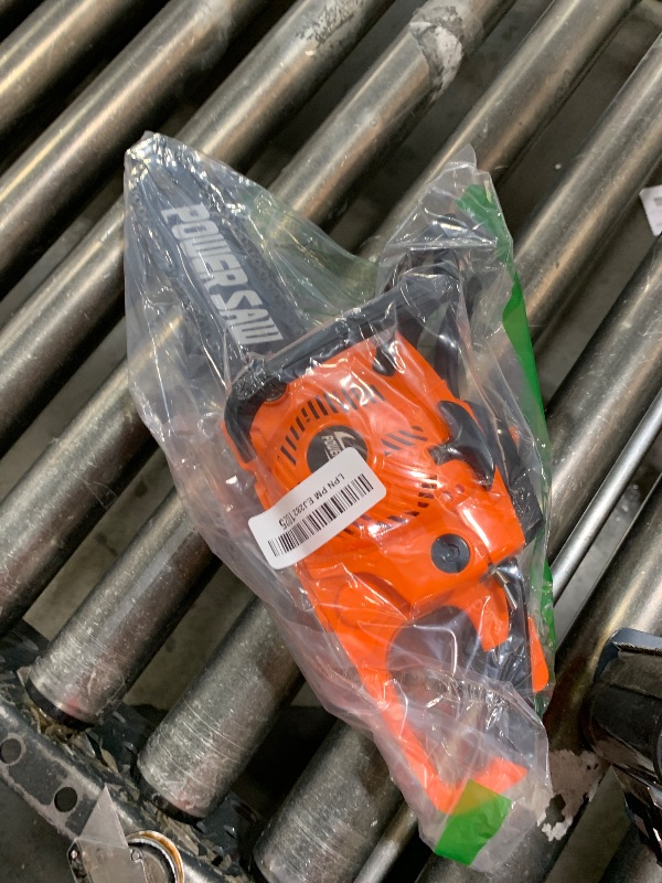 Photo 1 of Toy Chainsaw for Boys and Girls- Outdoor Power Tool for Pretend Play-Battery Powered with Pull Cord, Rotating Chain and Realistic Sounds by Hey! Play! , Orange