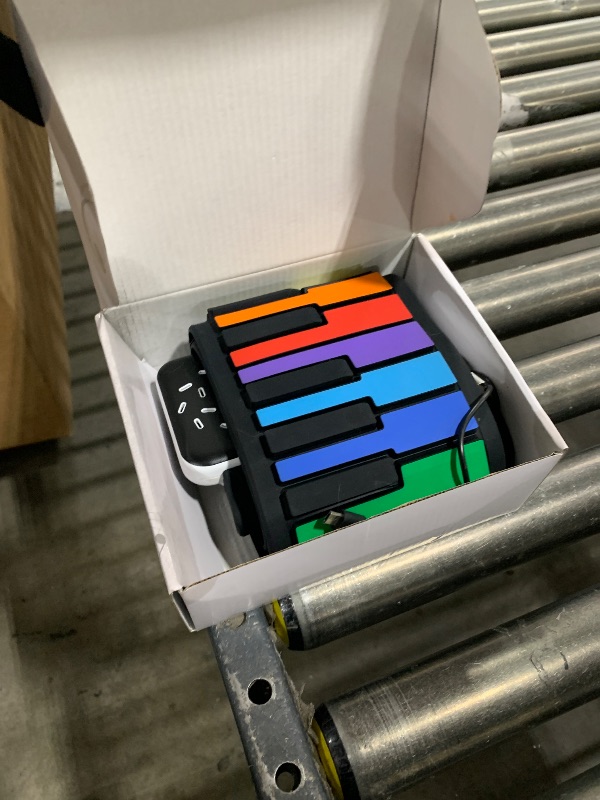 Photo 1 of POGOLAB 49 Key Roll Up Keyboard Piano, Portable Digital Electric Foldable Piano Keyboard