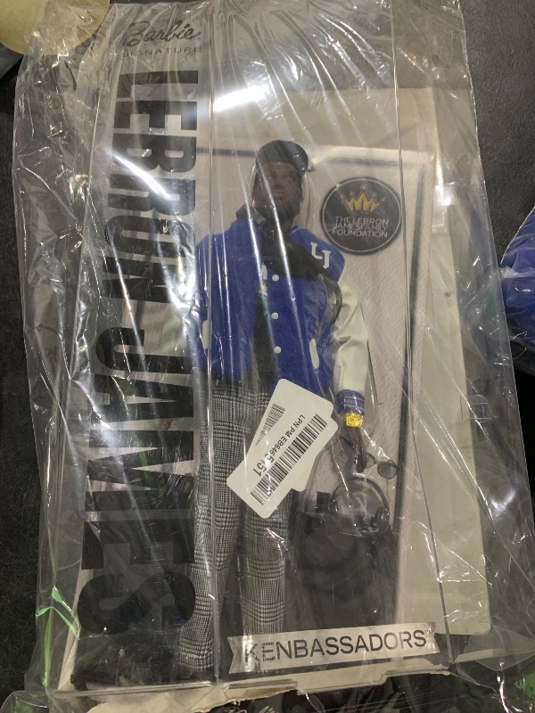 Photo 1 of Barbie Signature Lebron James Kenbassadors Doll Collectible with Varsity Bomber Jacket Outfit & Accessories Including Headphones, Sunglasses, & More