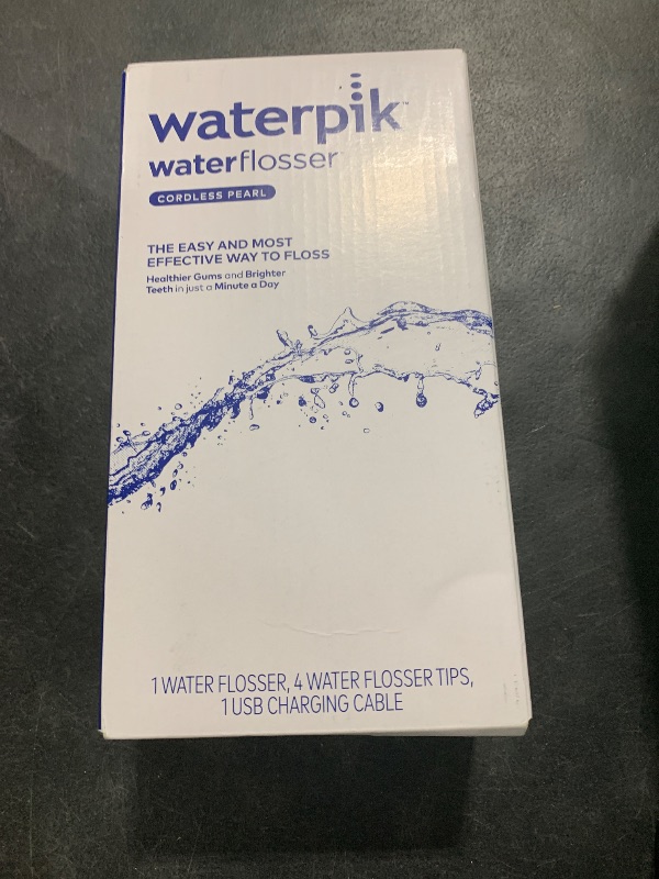 Photo 1 of Waterpik Cordless Pearl Rechargeable Portable Water Flosser for Teeth, Gums, Braces Care and Travel with 4 Flossing Tips - ADA Accepted, WF-13 Black, Packaging May Vary
