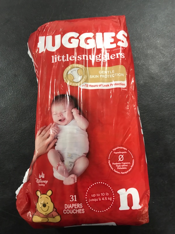 Photo 1 of Huggies Newborn Diapers, Little Snugglers Baby Diapers, Size Newborn (up to 10 lbs), 31 Count