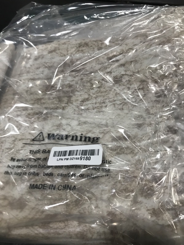 Photo 1 of Soalmost 5x7 Area Rugs Beige Low Pile Indoor Washable Trendy Faded Style Rugs for Bedroom Living Room Dining Room Foldable Non-Slip Thin Print Mat