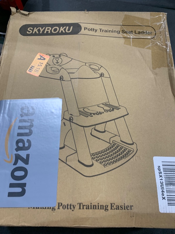 Photo 1 of SKYROKU Potty Training Toilet, New Sector-Shape Stabilized Base two in one Toddler Toilet Seat with Splash Guard, Anti Slip Pad, and Step Stool Dark Blue