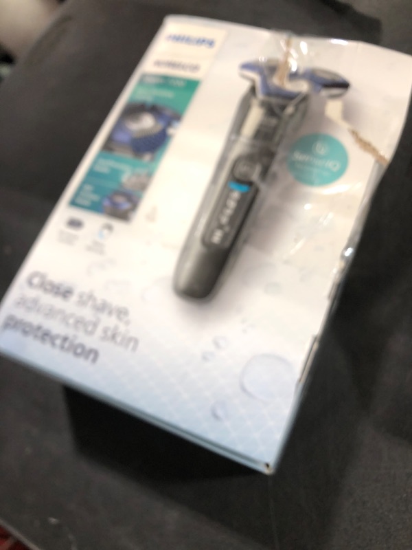 Photo 1 of Philips Norelco Shaver 7200, Rechargeable Wet & Dry Electric Shaver with SenseIQ Technology and Pop-up Trimmer, S7887/82