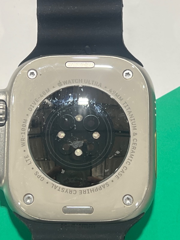 Photo 1 of Apple Watch Ultra [GPS + Cellular 49mm] Titanium Case with Midnight Ocean Band, One Size (Renewed Premium)