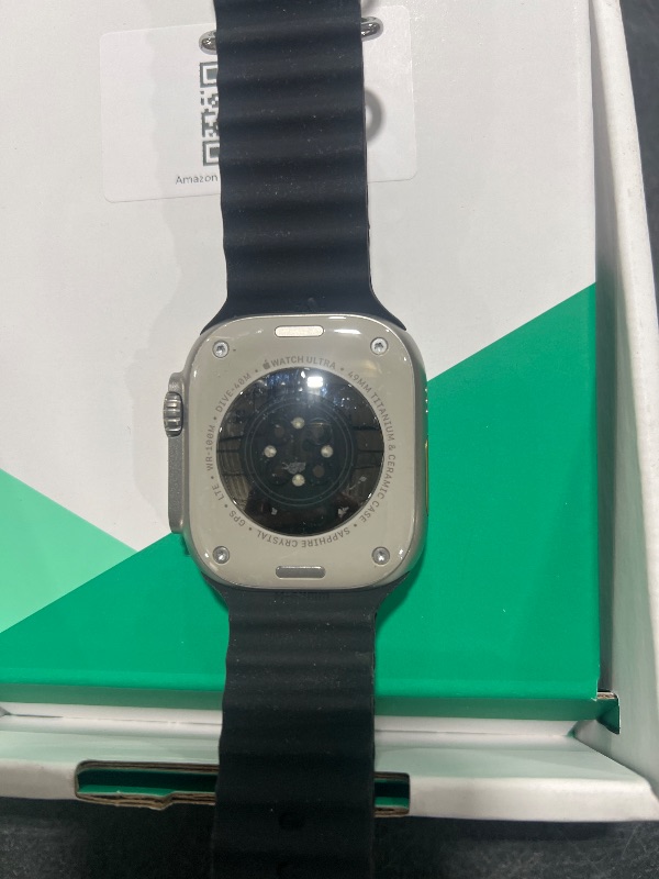 Photo 1 of Apple Watch Ultra [GPS + Cellular 49mm] Titanium Case with Midnight Ocean Band, One Size (Renewed Premium)