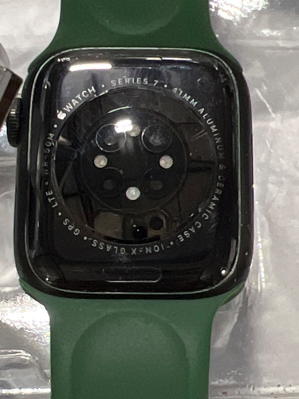 Photo 1 of Apple Watch Series 7 (GPS + Cellular, 41mm) Green Aluminum Case with Clover Sport Band, Regular (Renewed)