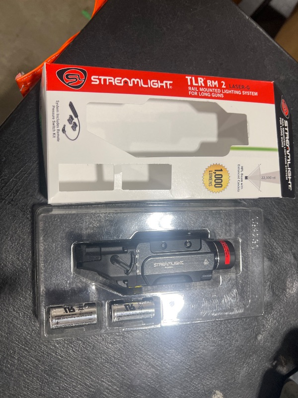 Photo 1 of Streamlight 69453 TLR RM 2 G 1000-Lumen Rail-Mounted Tactical Weapon Light with Integrated Green Aiming Laser, Remote Pressure Switch, and Key Kit, Black