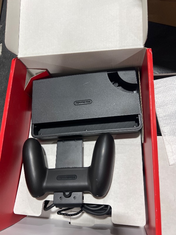Photo 1 of Nintendo Switch – OLED Model w/ Neon Red & Neon Blue Joy-Con