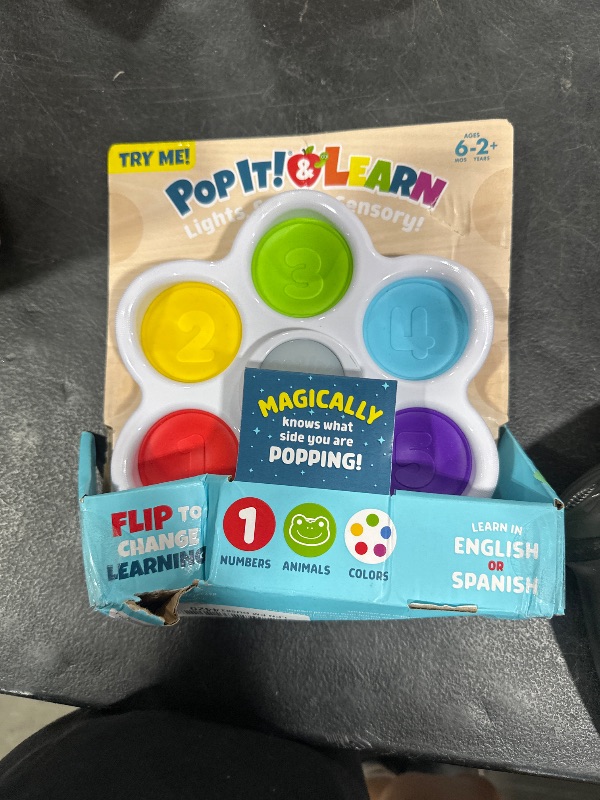 Photo 1 of Chuckle & Roar - Pop It! and Learn - Educational and Electronic Popping Toy - Learn Numbers & Letters in Spanish or English - Great for Ages 6 Months to 2 Years