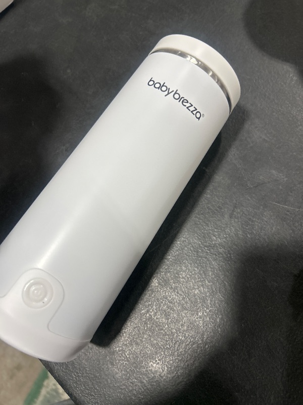 Photo 1 of Baby Brezza Superfast Portable Baby Bottle Warmer – 67% Faster - Travel Breastmilk Warmer and Formula Warmer - Safe, Even Heating - Up to 9oz - No Adapters, White