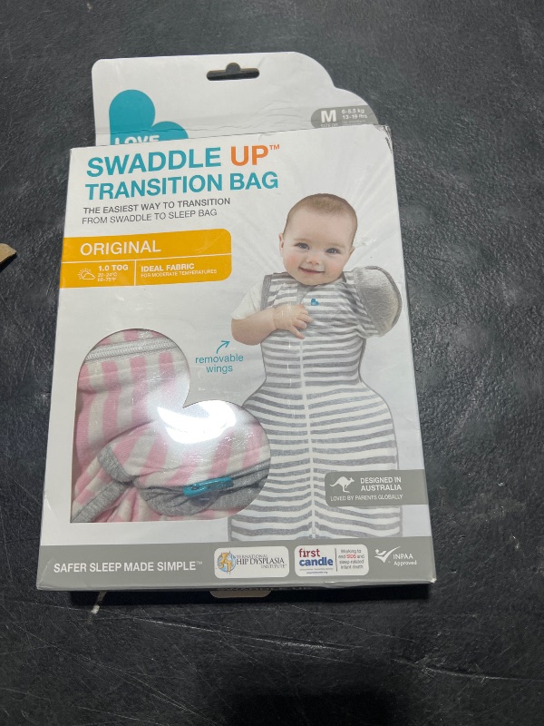 Photo 1 of swaqddle up size med 