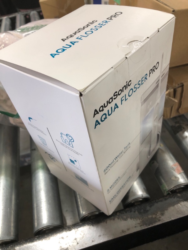 Photo 1 of AquaSonic Aqua Flosser PRO | Professional Water Flosser with Large Capacity Reservoir | Oral Irrigator w/ 2 Modes, 10 Levels of Water Pressure, 4 Included Tips | Sleek & Compact | Dentist Recommended