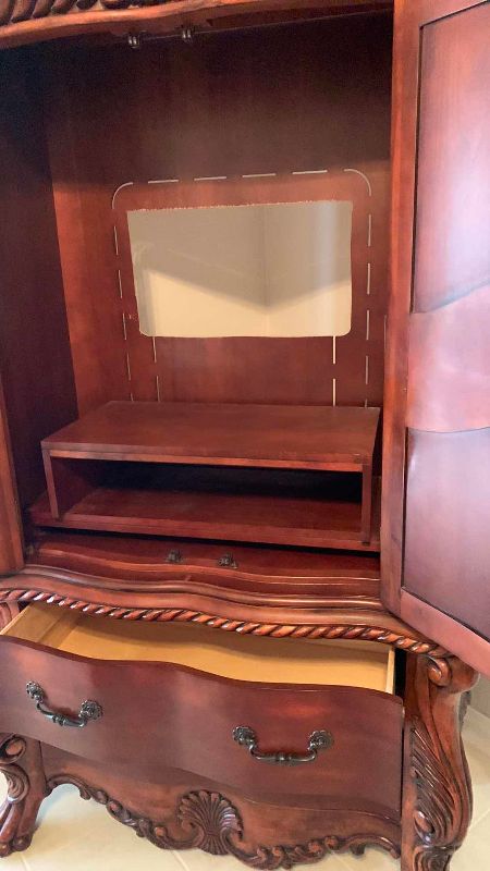 Photo 1 of CLAWFOOT ENTERTAINMENT CENTER 44” X 24” H 80”
