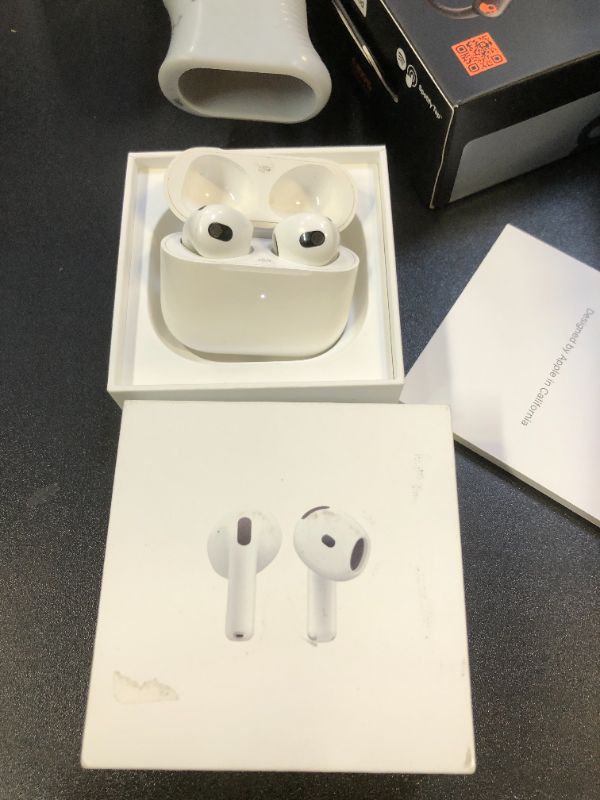 Photo 2 of Apple AirPods 4 Wireless Earbuds, Bluetooth Headphones, Personalized Spatial Audio, Sweat and Water Resistant, USB-C Charging Case, H2 Chip, Up to 30 Hours of Battery Life, Effortless Setup for iPhone