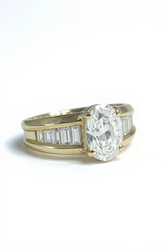Photo 1 of 14K YELLOW GOLD W. 1CT OVAL DIAMOND & .50CT BAGUETTE DIAMOND RING-4.4G SIZE 6 #27