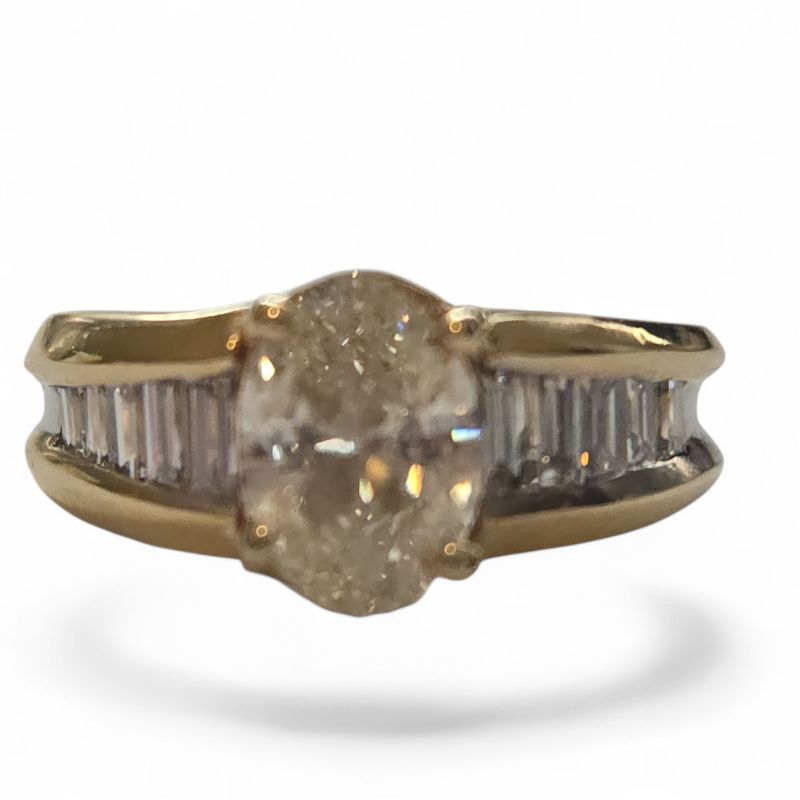 Photo 1 of 14K YELLOW GOLD W. 1CT OVAL DIAMOND & .50CT BAGUETTE DIAMOND RING-4.4G SIZE 6 #27