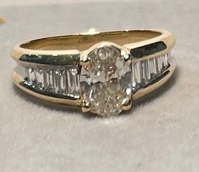 Photo 1 of 14K YELLOW GOLD W. 1CT OVAL DIAMOND & .50CT BAGUETTE DIAMOND RING-4.4G SIZE 6 #27