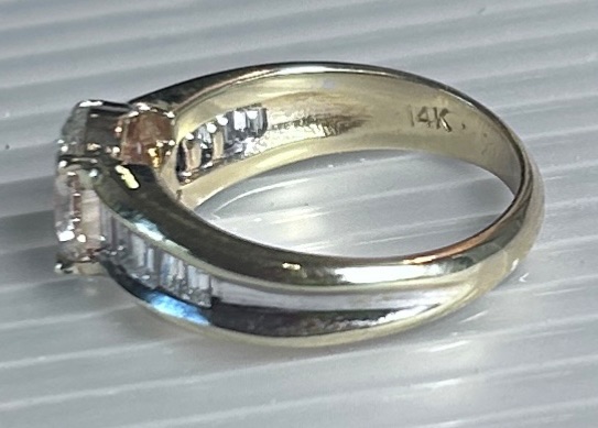 Photo 1 of 14K YELLOW GOLD W. 1CT OVAL DIAMOND & .50CT BAGUETTE DIAMOND RING-4.4G SIZE 6 #27