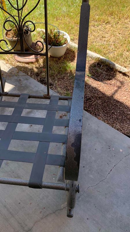 Photo 1 of TWO METAL ROCKING PATIO CHAIRS