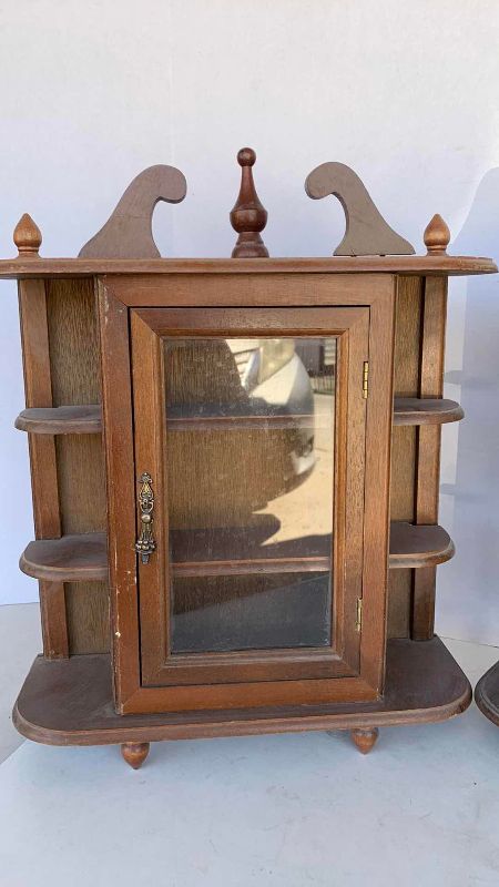Photo 1 of TWO CURIO CABINETS 17”