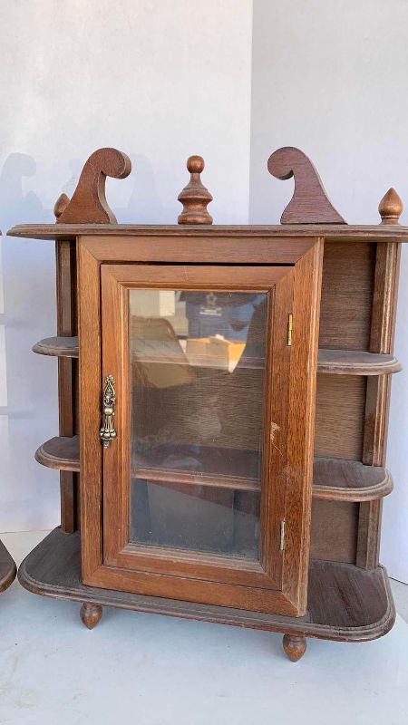 Photo 1 of TWO CURIO CABINETS 17”