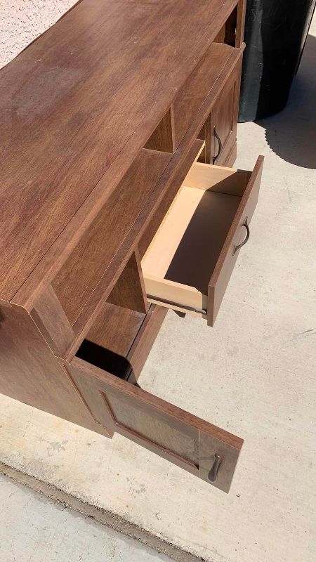 Photo 1 of TELEVISION CABINET 46” X 17” H 24”