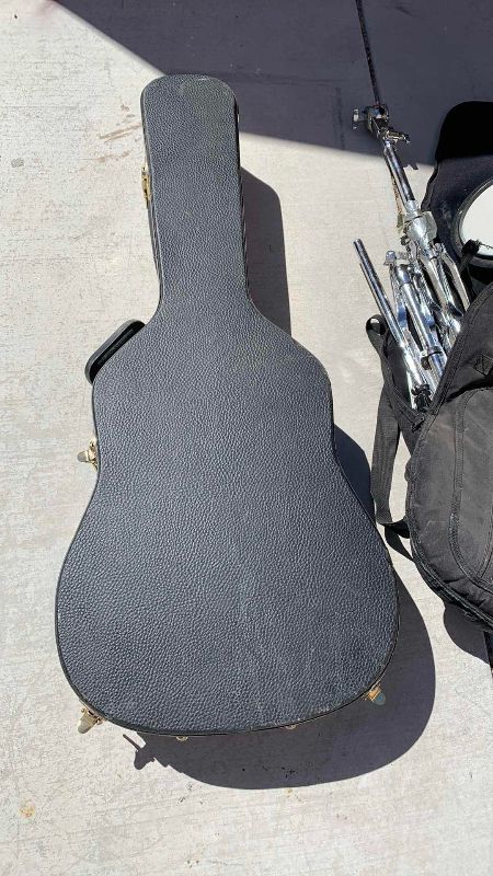 Photo 1 of ACOUSTIC GUITAR CASE, STAND AND a PEARL PRACTICE DRUM HEAD