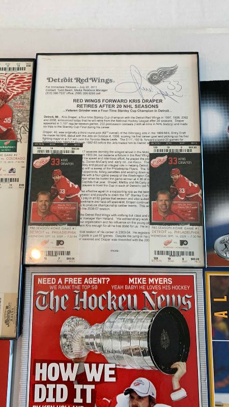 Photo 1 of NHL HOCKEY JIRI FISCHER SIGNED ARTICLE AND OTHER DETROIT RED WINGS ITEMS