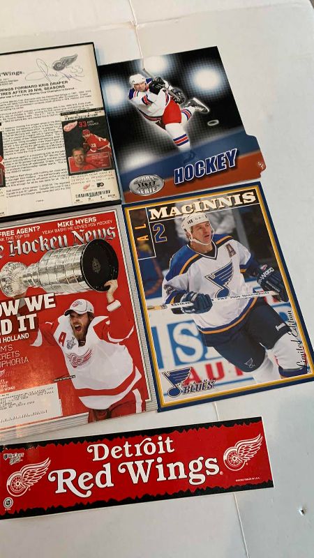 Photo 1 of NHL HOCKEY JIRI FISCHER SIGNED ARTICLE AND OTHER DETROIT RED WINGS ITEMS