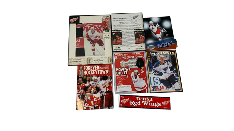 Photo 1 of NHL HOCKEY JIRI FISCHER SIGNED ARTICLE AND OTHER DETROIT RED WINGS ITEMS