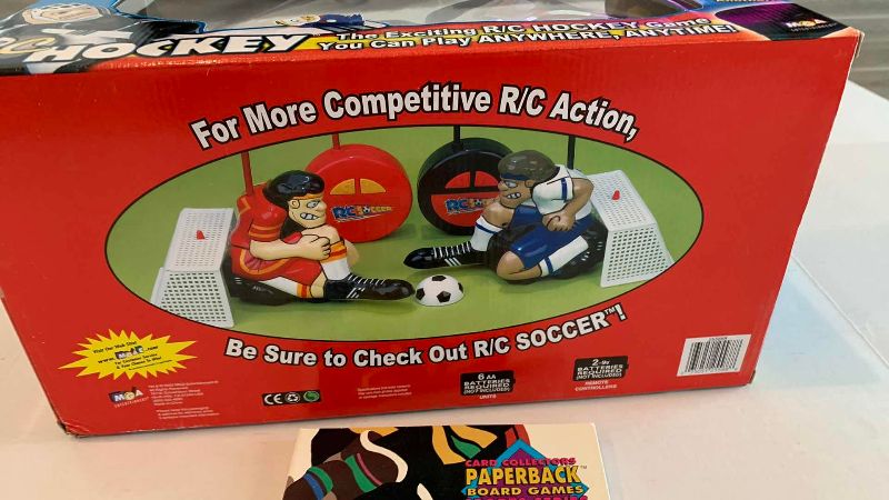 Photo 1 of NHL R/C HOCKEY GAME AND A STRATEGY BOARD GAME