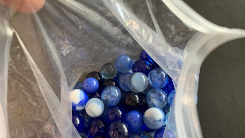 Photo 1 of VINTAGE GLASS MARBLES DIFFERENT SIZES