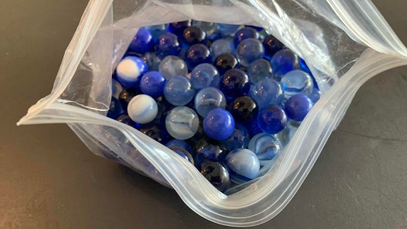 Photo 1 of VINTAGE GLASS MARBLES DIFFERENT SIZES