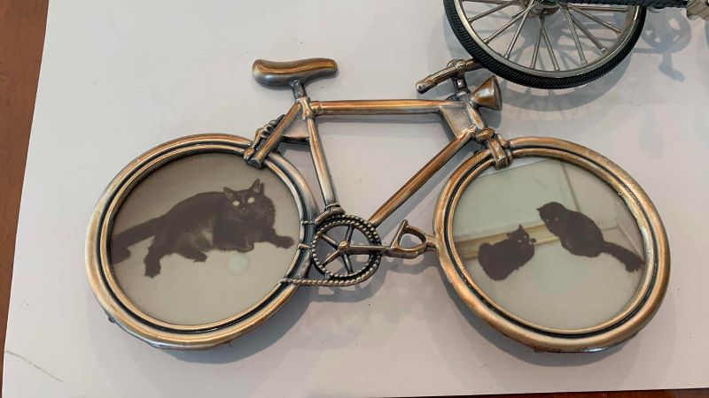 Photo 1 of 3-BICYCLES 7.5” PEDALS TURN THE TIRES AND PHOTOS FRAME