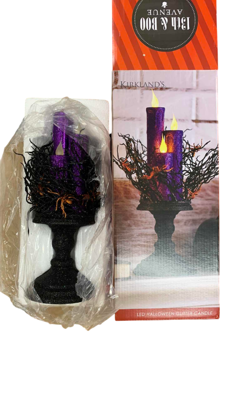 Photo 1 of BOX OF 4 KIRKLAND’S LED HALLOWEEN GLITTER CANDLES