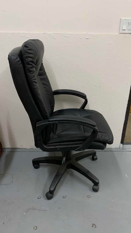 Photo 1 of FAUX LEATHER HIBACK OFFICE CHAIR WITH ROLLERS