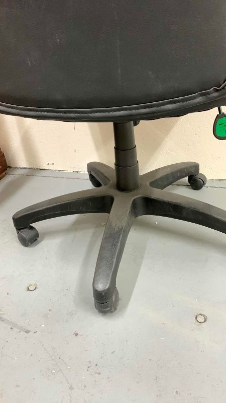 Photo 1 of FAUX LEATHER HIBACK OFFICE CHAIR WITH ROLLERS